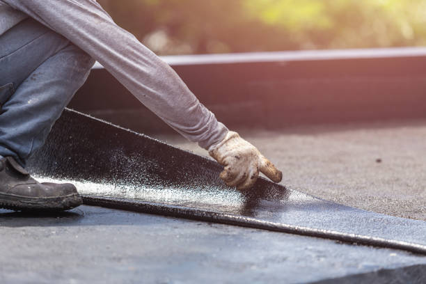 Professional Waterproofing technician working in Woodland, WI